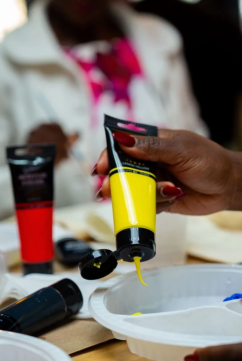 M-Pesa × One Africa Paint & Sip experience moment